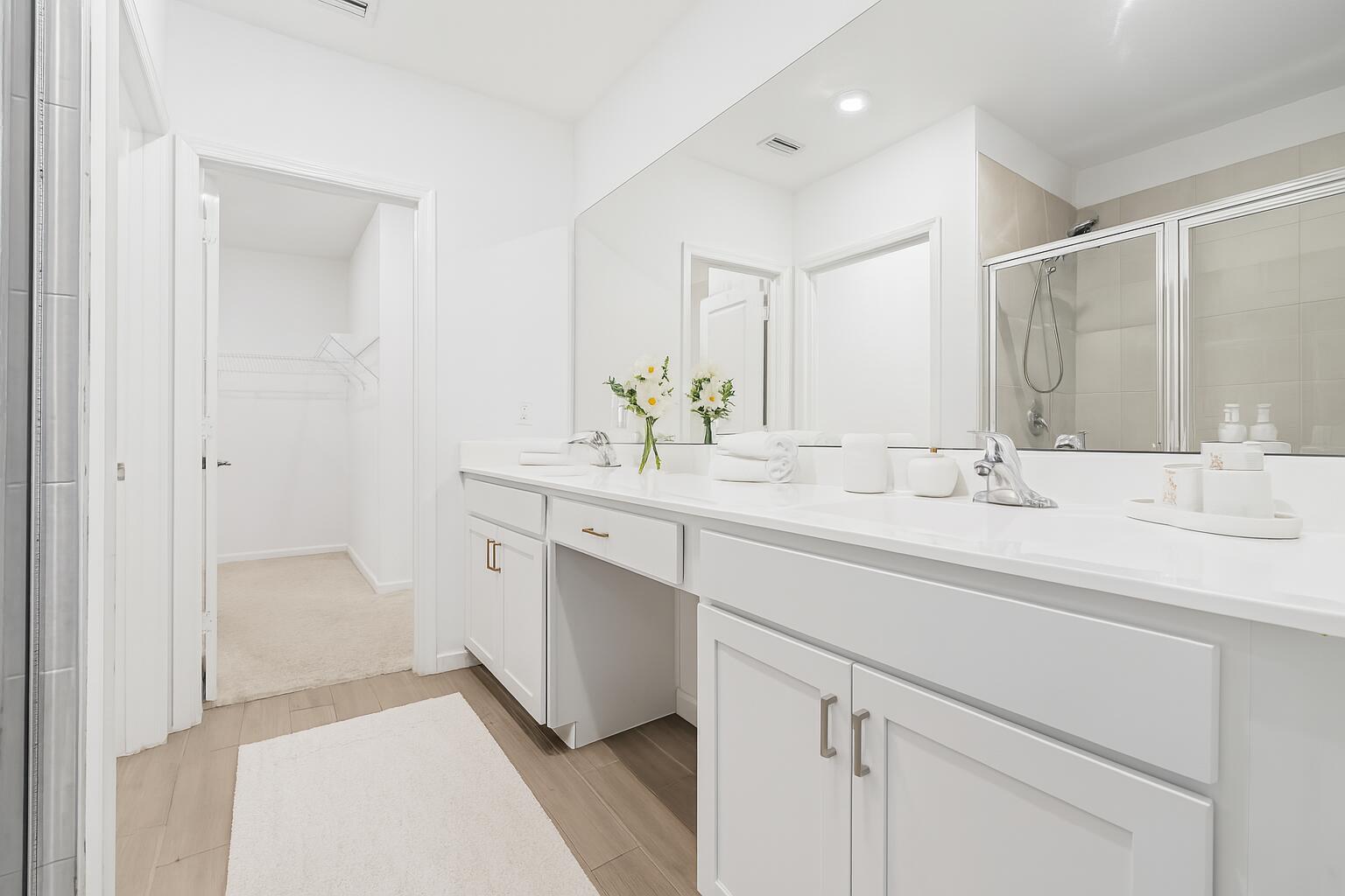 738 Worlington Lane Fort Pierce, FL 34947 - Photo 24 of 69 a bathroom with a sink double vanity and a mirror