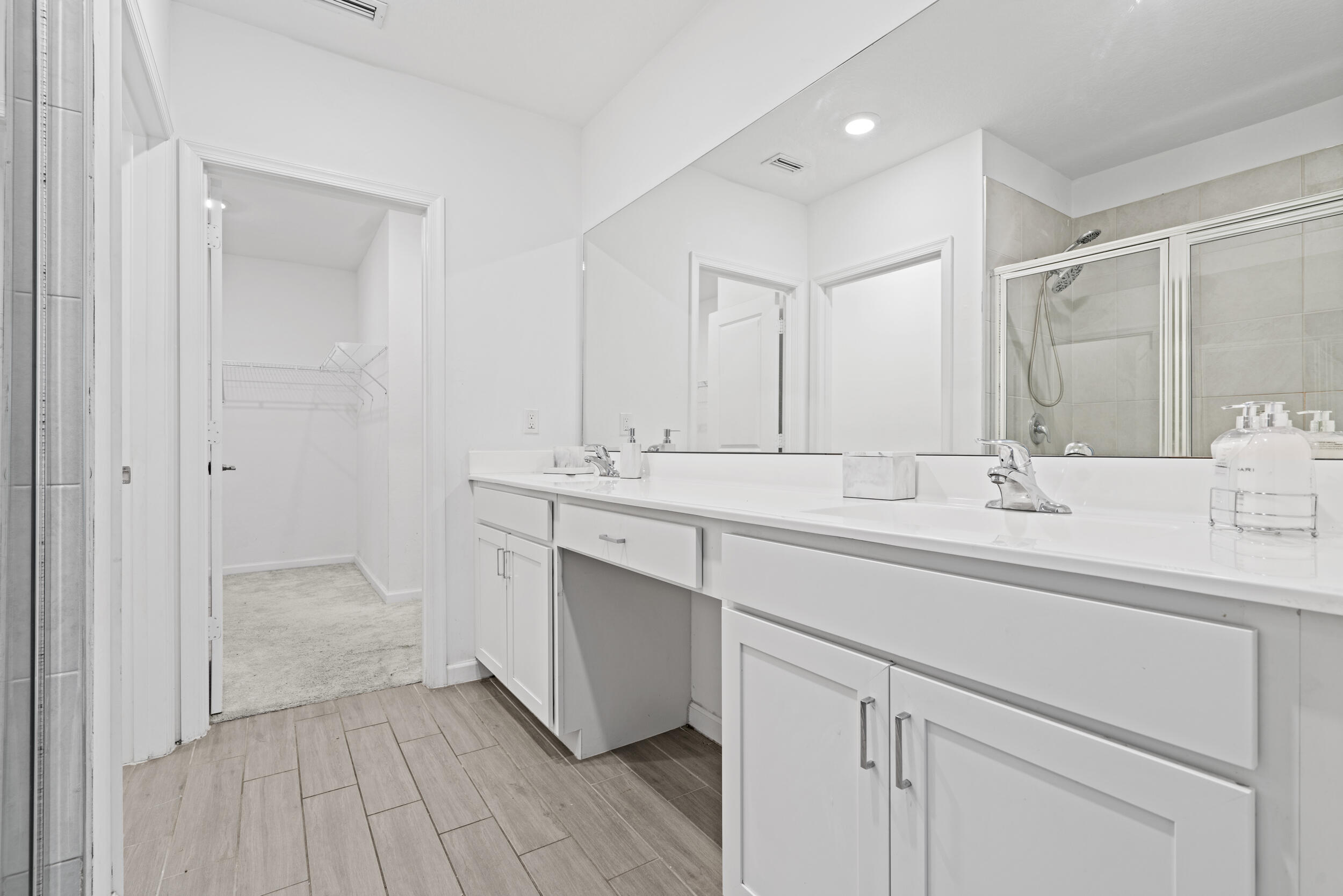738 Worlington Lane Fort Pierce, FL 34947 - Photo 25 of 69 a bathroom with a sink double vanity and a mirror