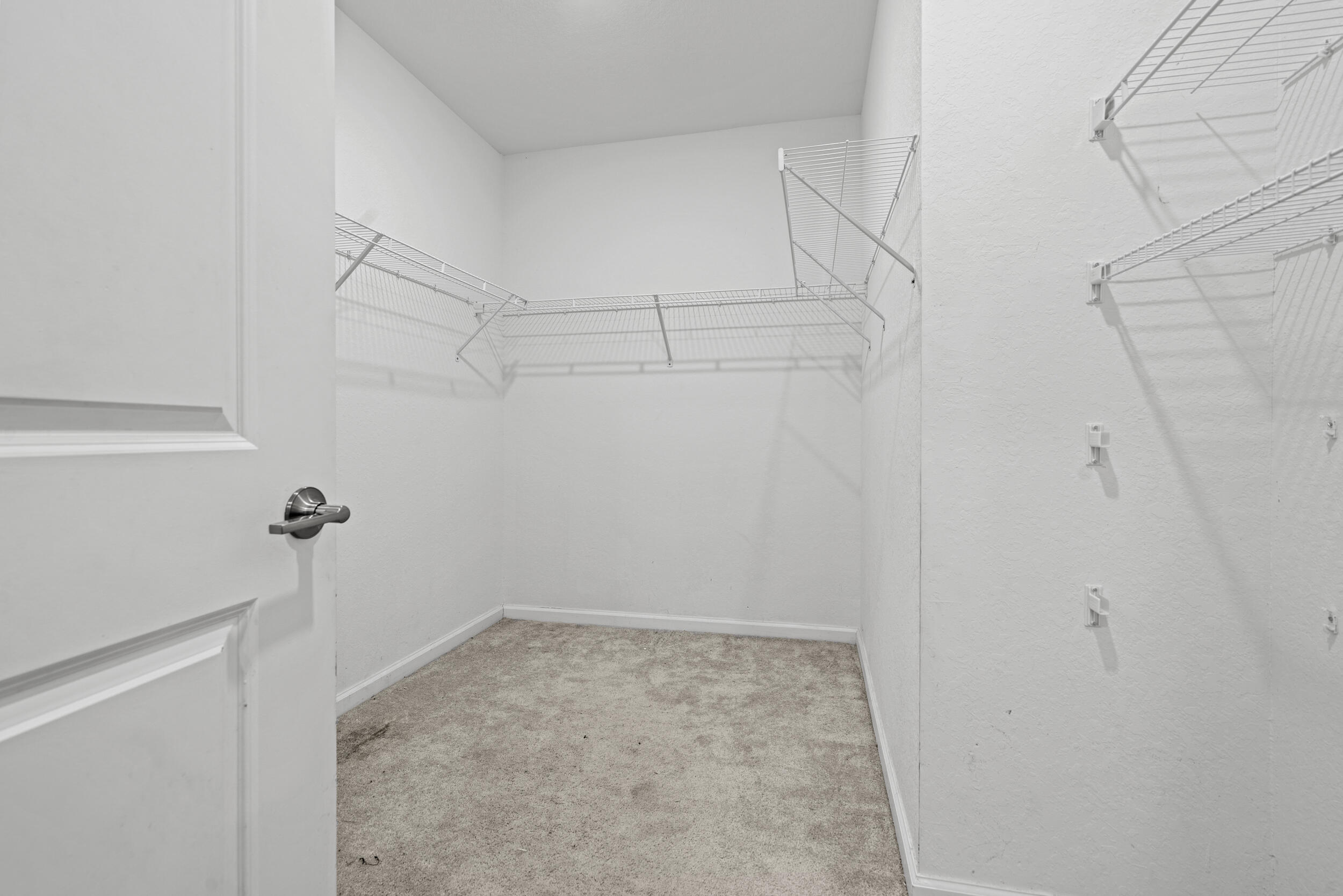 738 Worlington Lane Fort Pierce, FL 34947 - Photo 26 of 69 a view of a room with racks on the wall