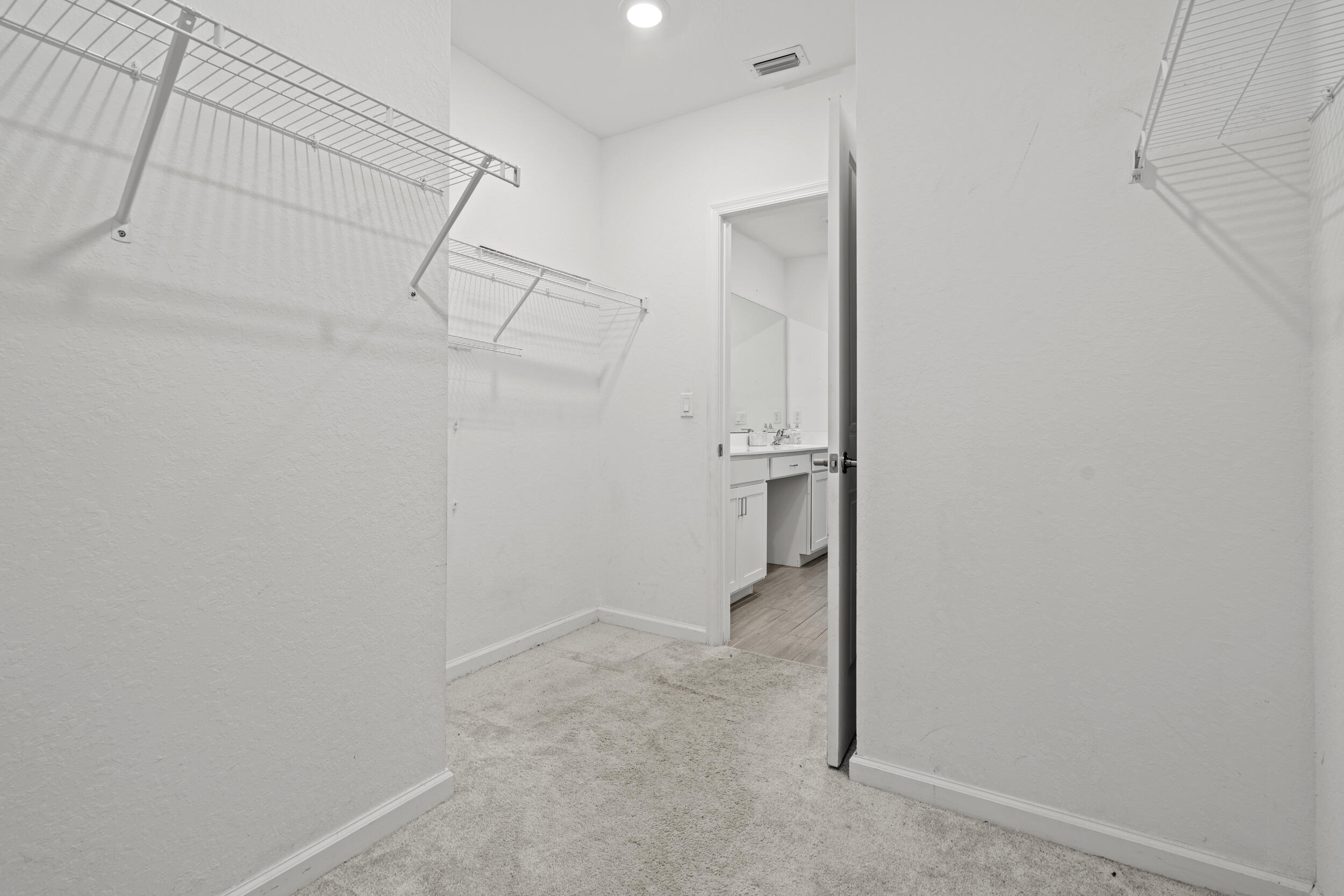 738 Worlington Lane Fort Pierce, FL 34947 - Photo 27 of 69 a view of a room with racks on the wall