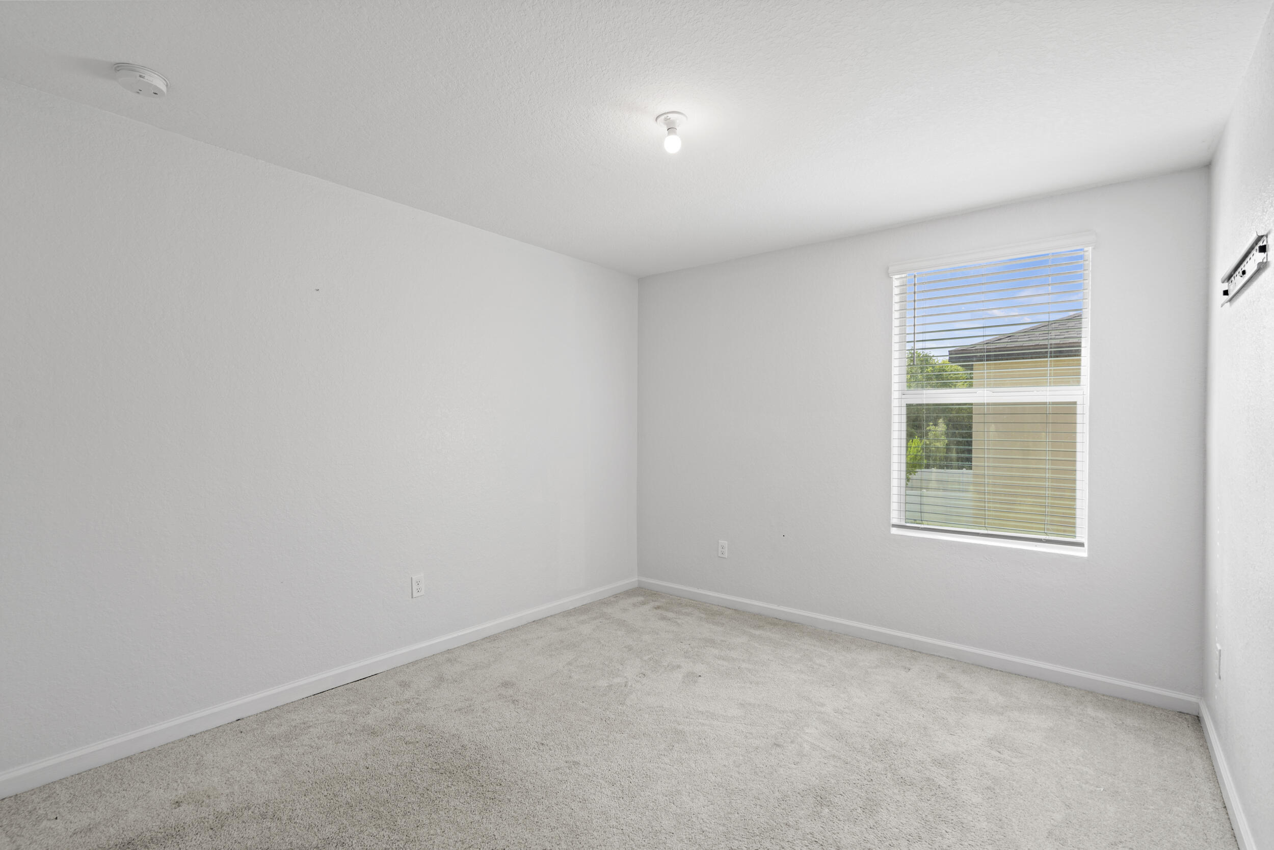 738 Worlington Lane Fort Pierce, FL 34947 - Photo 41 of 69 an empty room with a window