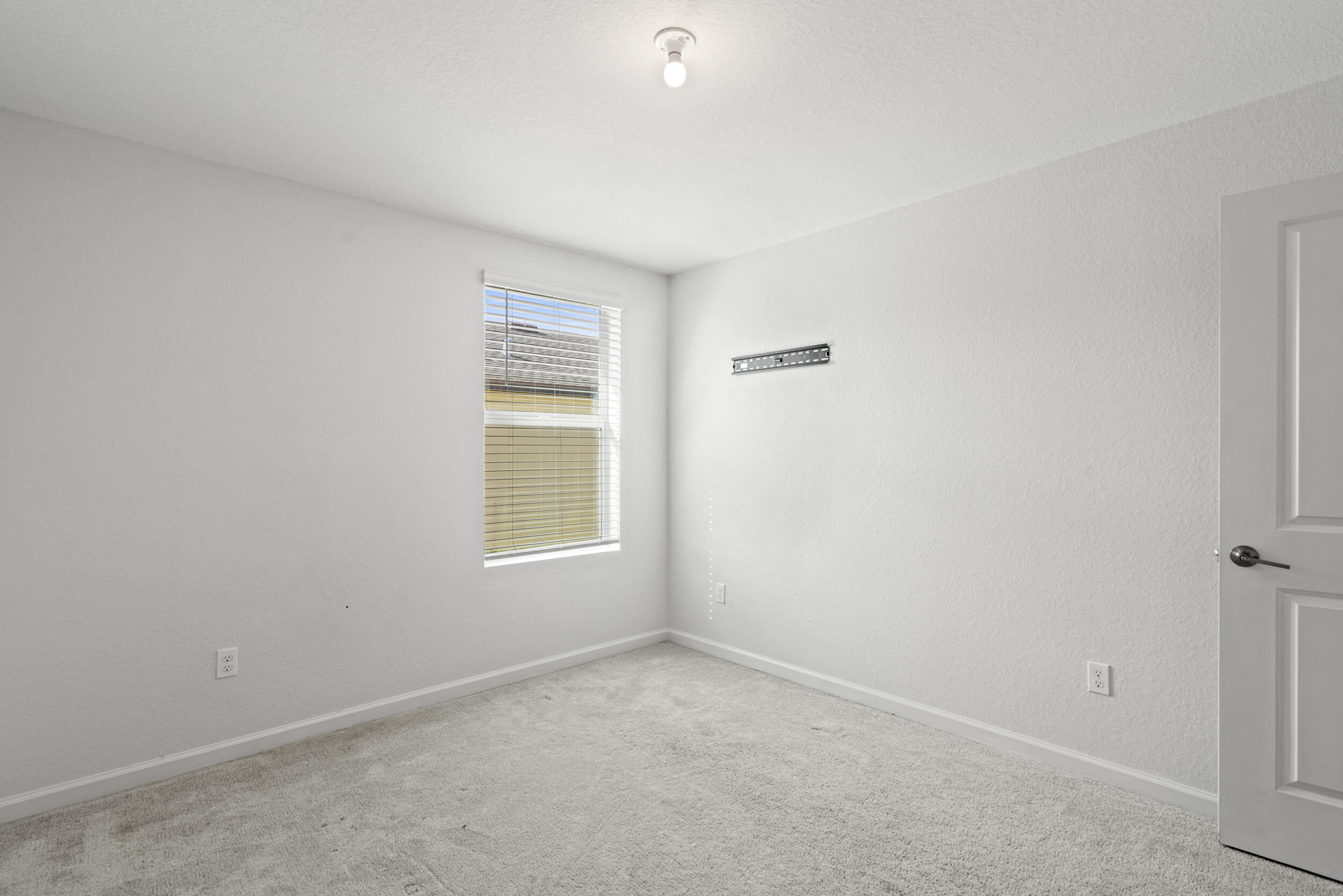 738 Worlington Lane Fort Pierce, FL 34947 - Photo 42 of 69 a view of an empty room with a window