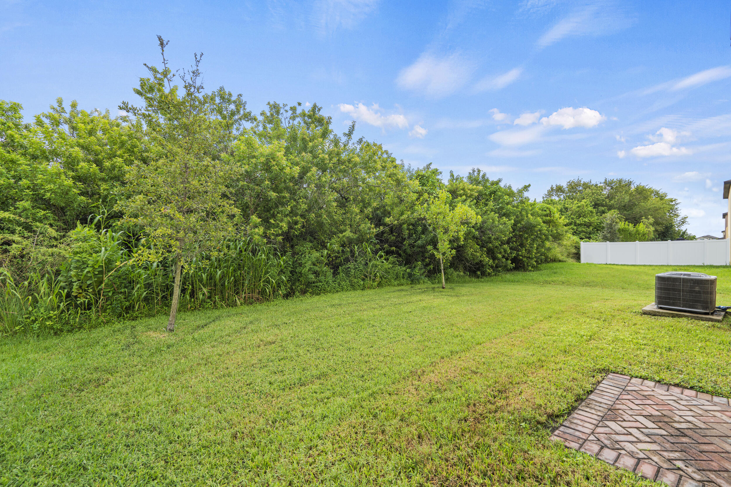 738 Worlington Lane Fort Pierce, FL 34947 - Photo 48 of 69 a view of a trees with a yard