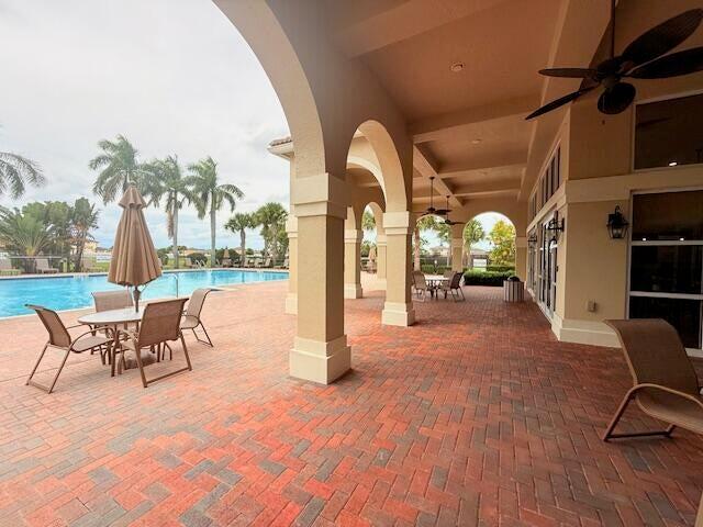 738 Worlington Lane Fort Pierce, FL 34947 - Photo 53 of 69 a view of a porch with furniture and a yard