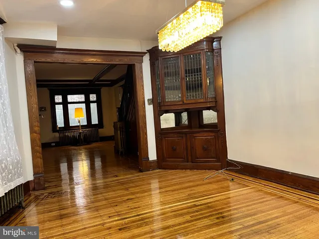 a view of a entryway with wooden floor