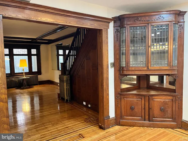 a kitchen with sink cabinets and microwave