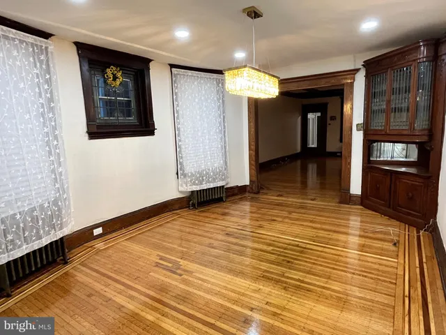 a view of staircase with lots of wooden floor