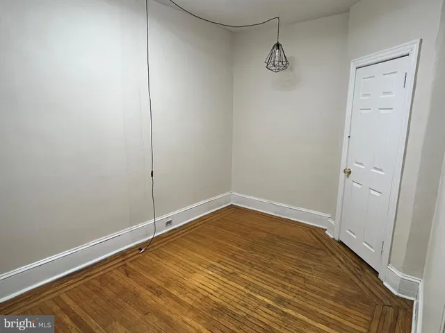 a bathroom with a shower and a toilet