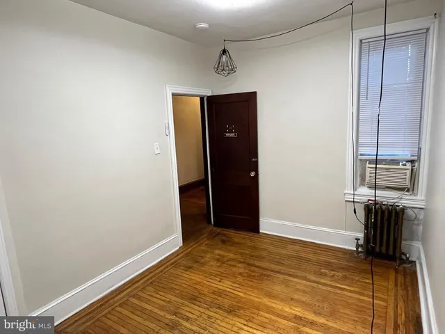 a bathroom with a sink vanity granite and a mirror
