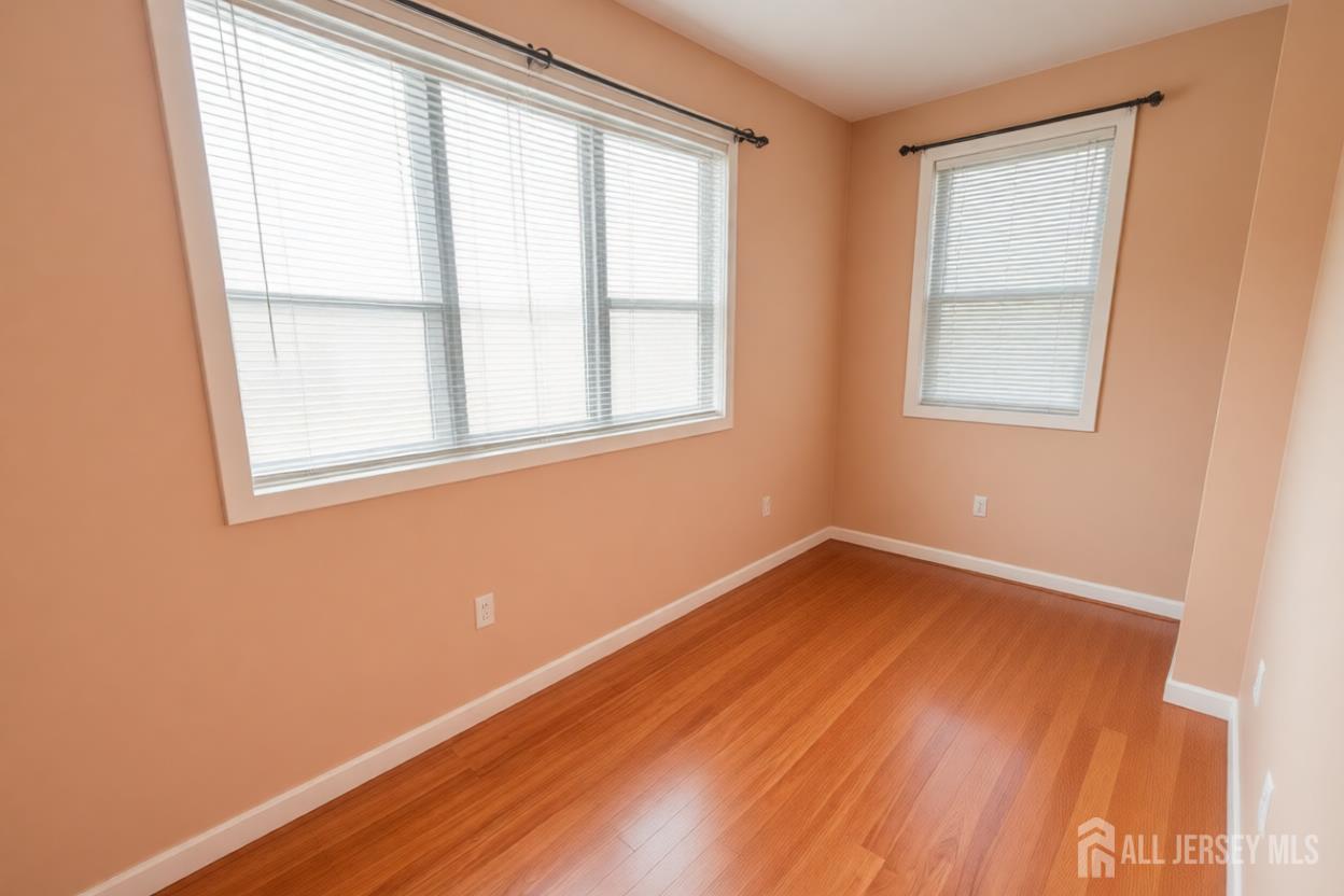 269 Silzer Street Perth Amboy, NJ 08861 - Photo 11 of 13 an empty room with a window