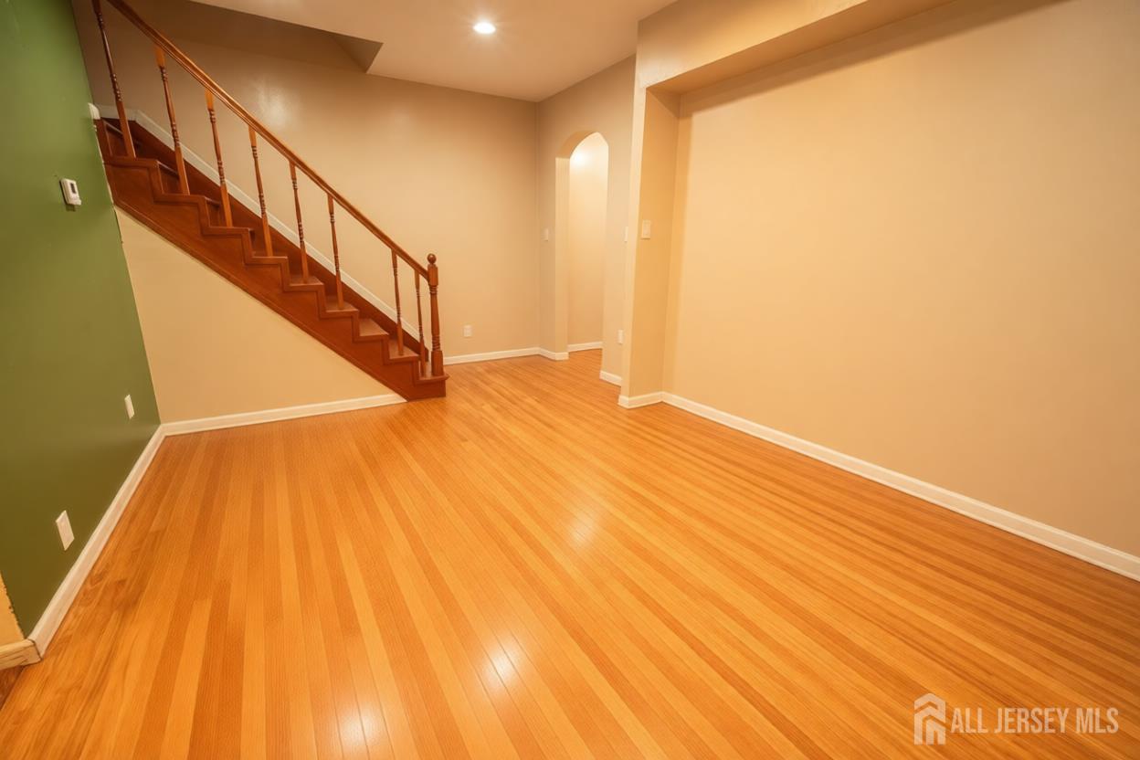 269 Silzer Street Perth Amboy, NJ 08861 - Photo 12 of 13 a view of entryway with wooden floor
