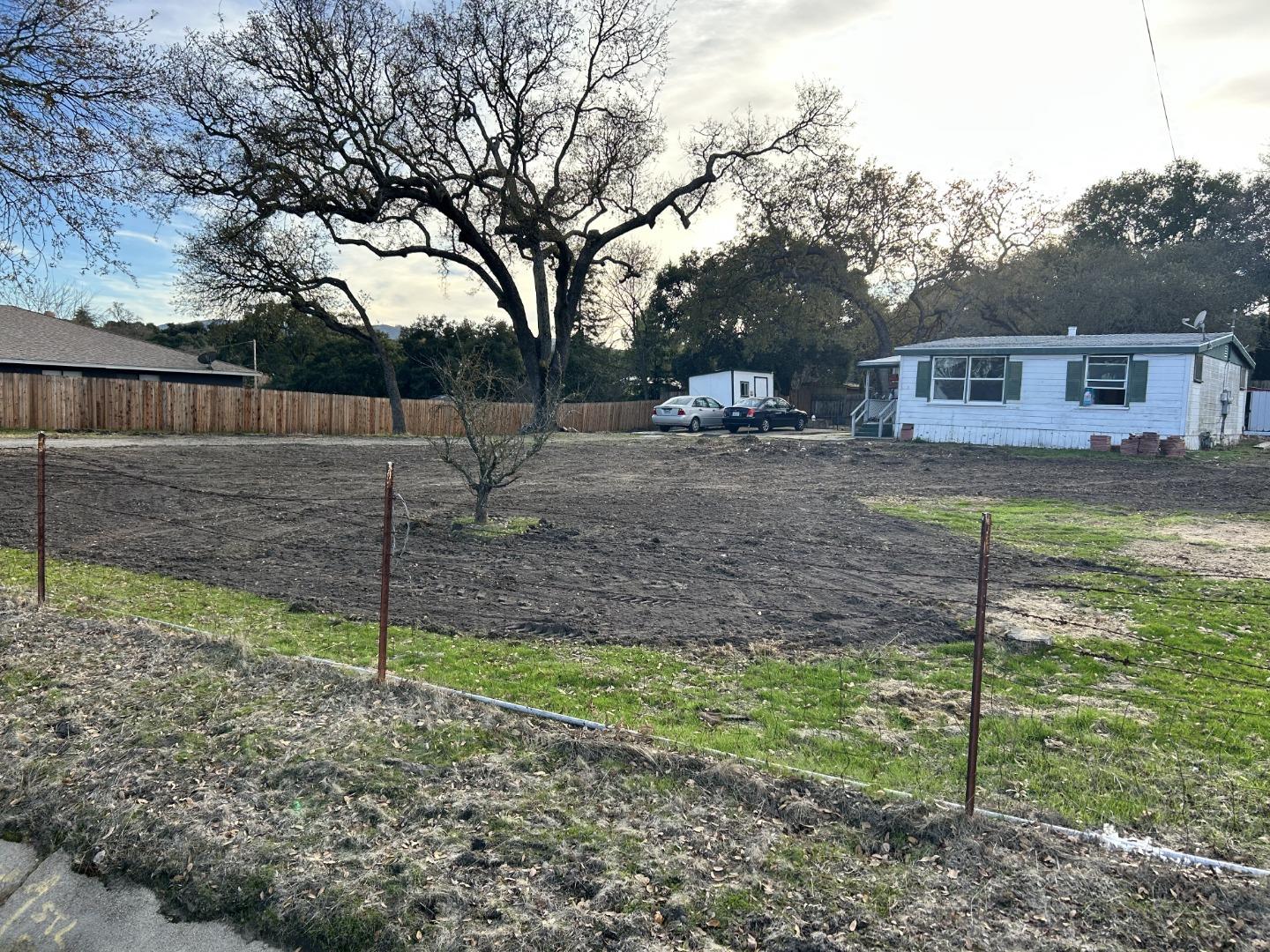 a backyard of a house with lots of green space