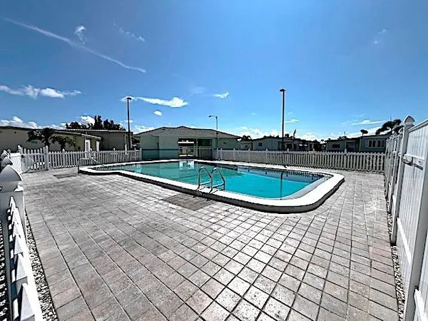 a view of outdoor space with swimming pool