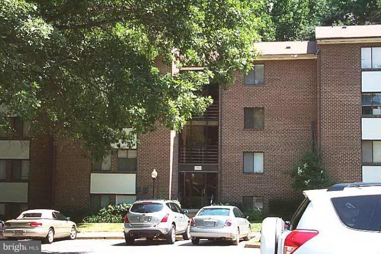 1554 Northgate Square, Unit 54/2A Reston, VA 20190 - Photo 2 of 5 a car parked on the side of a street