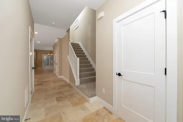a view of a hallway with entryway