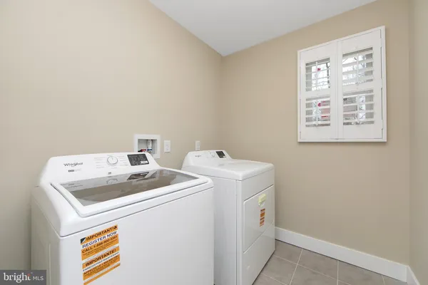 a view of an empty room with a sliding door