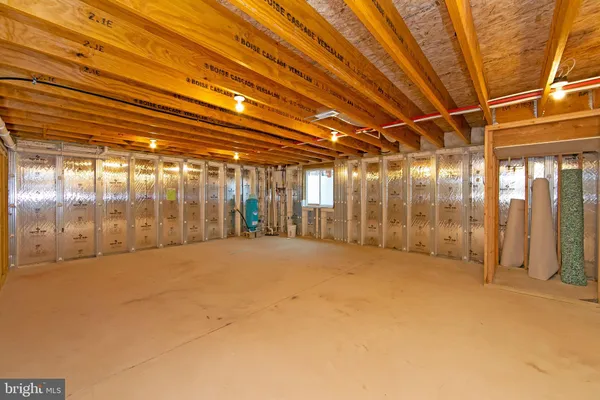 a view of a house with a yard and garage