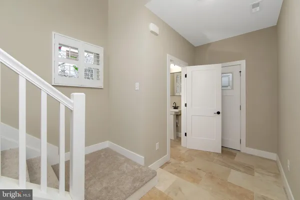 a bathroom with a sink and mirror