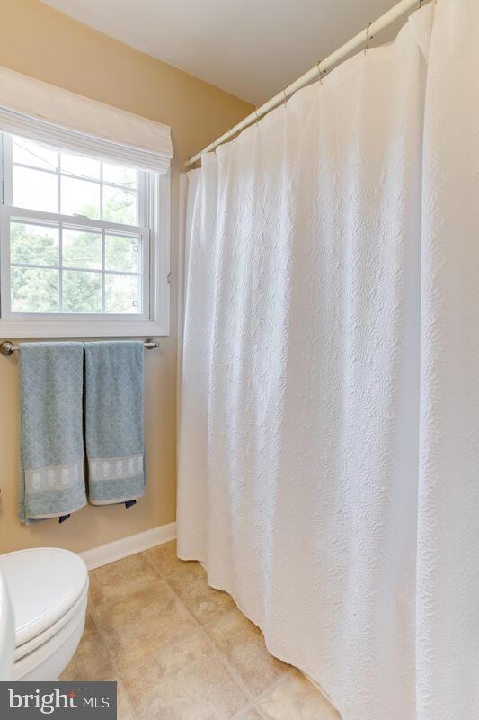 302 Homewood Road Linthicum, MD 21090 - Photo 17 of 56 Soaking tub/shower in main level bath.