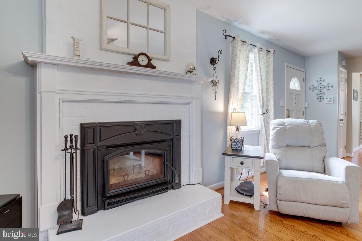 302 Homewood Road Linthicum, MD 21090 - Photo 4 of 56 LR-wood burning fireplace with insert