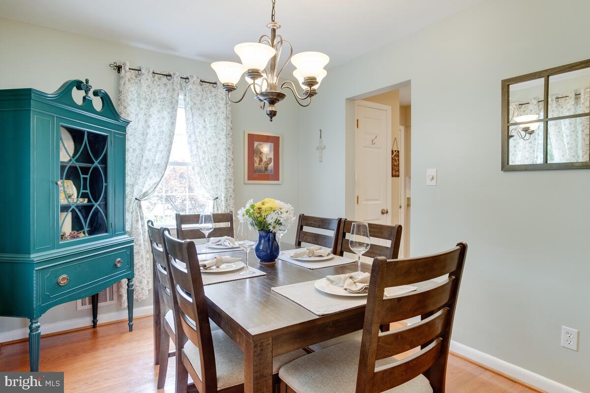 302 Homewood Road Linthicum, MD 21090 - Photo 6 of 56 Dining Room-wood flooring, painted in 2021