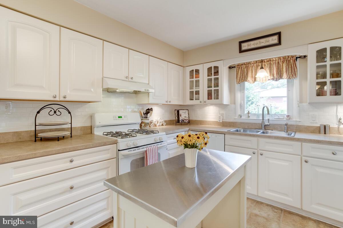 302 Homewood Road Linthicum, MD 21090 - Photo 9 of 56 abundance of cabinetry in the remodeled kitchen