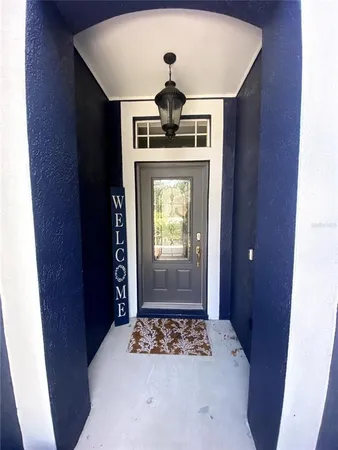 a view of wooden floor in a hallway