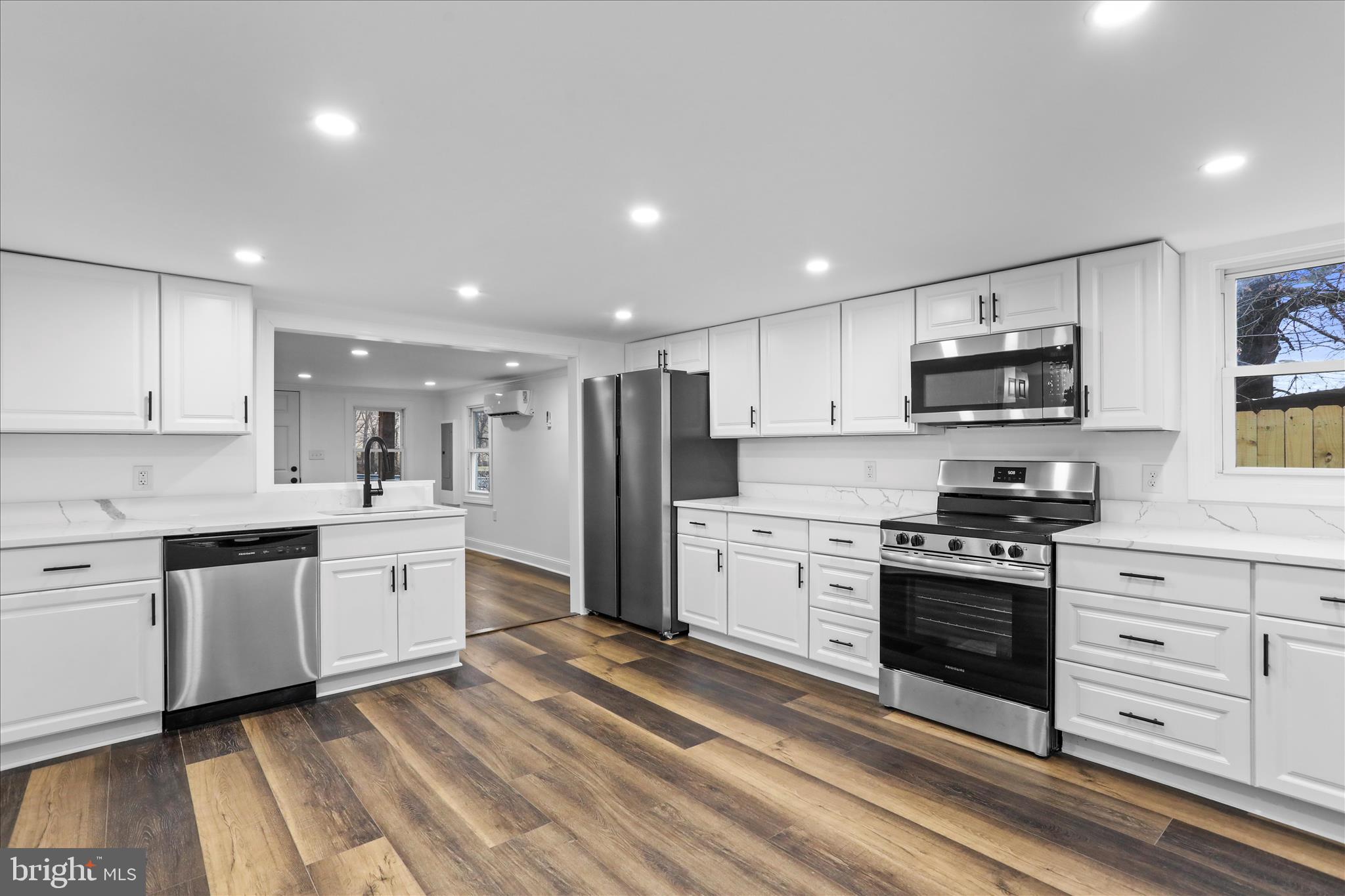 6906 Mariah Furnace Road Boonsboro, MD 21713 - Photo 15 of 38 a large kitchen with stainless steel appliances granite countertop a stove and a sink