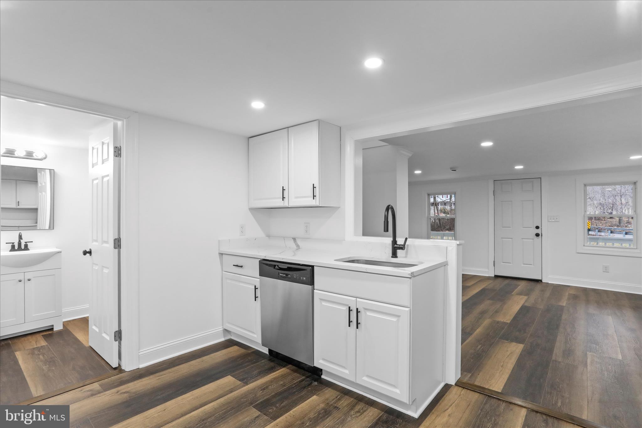 6906 Mariah Furnace Road Boonsboro, MD 21713 - Photo 17 of 38 a kitchen with white cabinets and sink