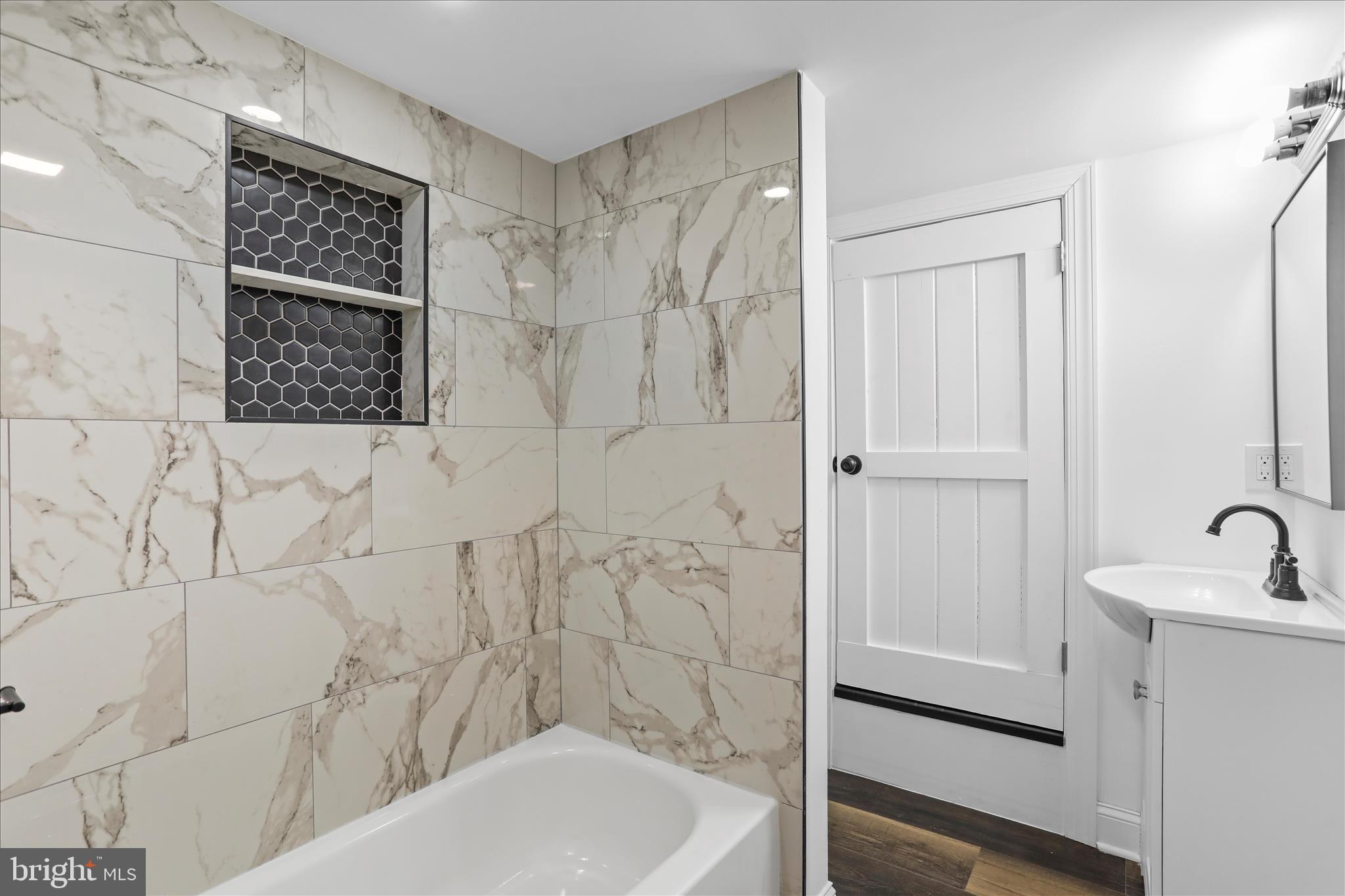 6906 Mariah Furnace Road Boonsboro, MD 21713 - Photo 19 of 38 a bathroom with a shower and a sink