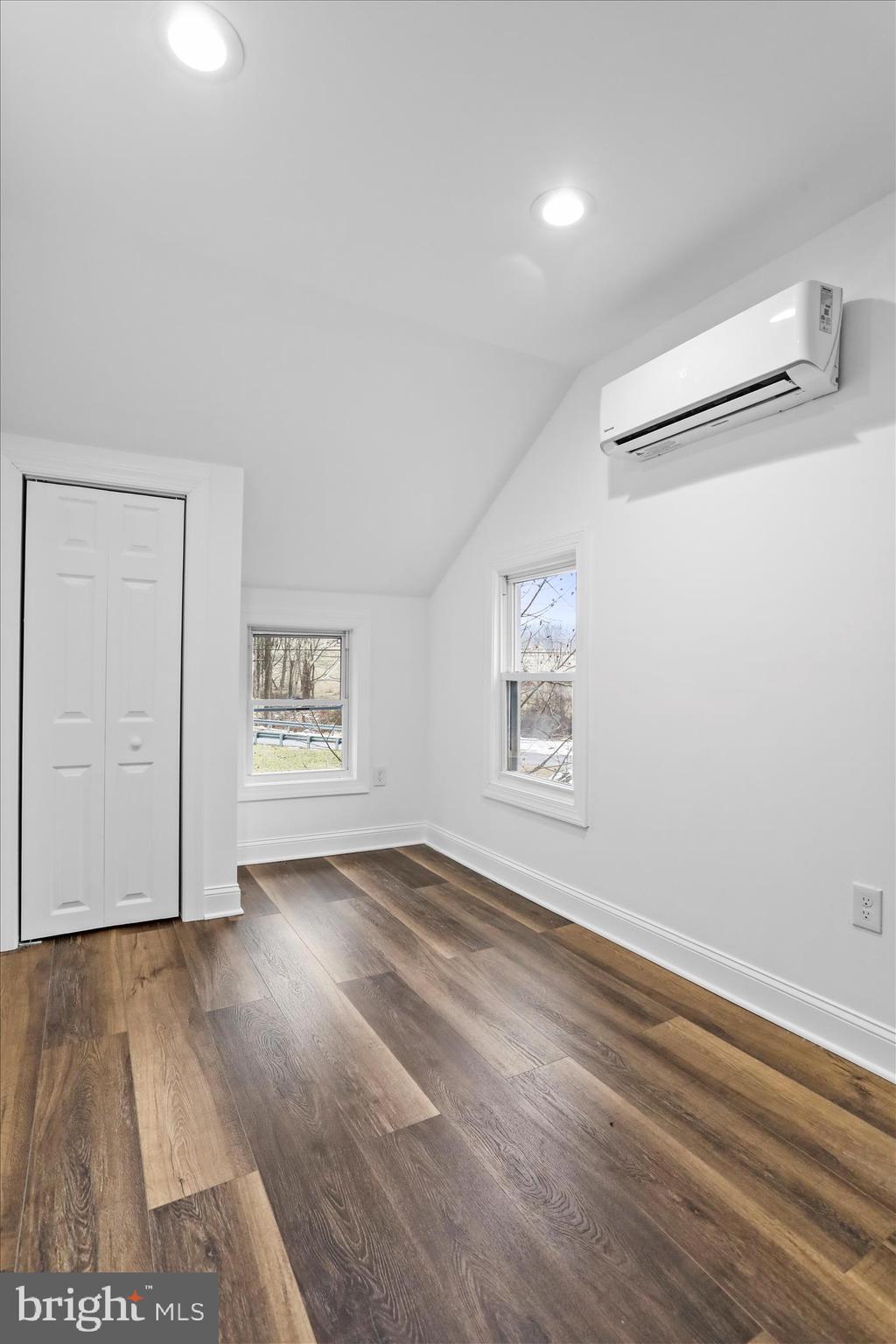 6906 Mariah Furnace Road Boonsboro, MD 21713 - Photo 23 of 38 an empty room with wooden floor and windows