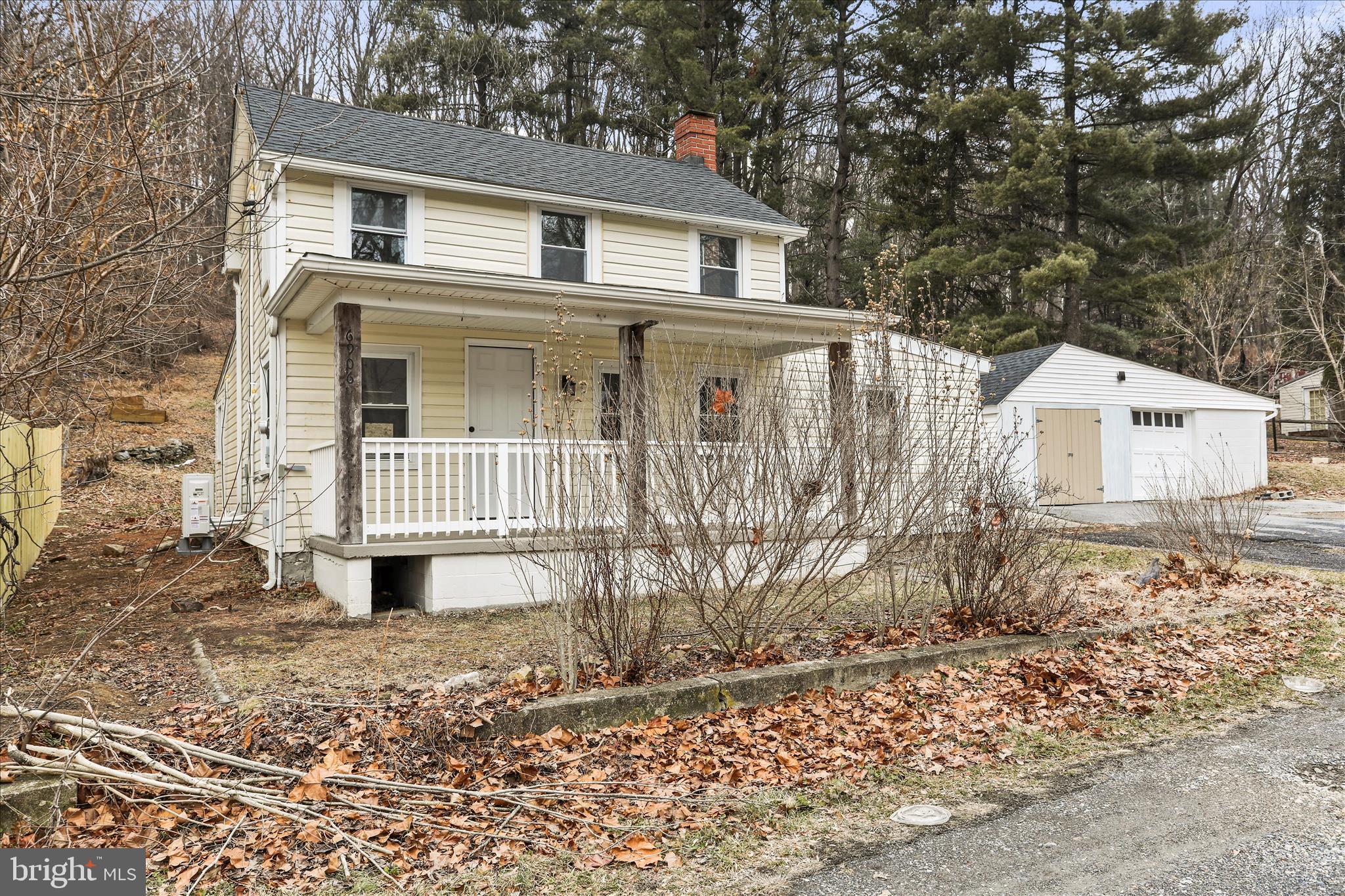 6906 Mariah Furnace Road Boonsboro, MD 21713 - Photo 37 of 38 a front view of a house with a yard