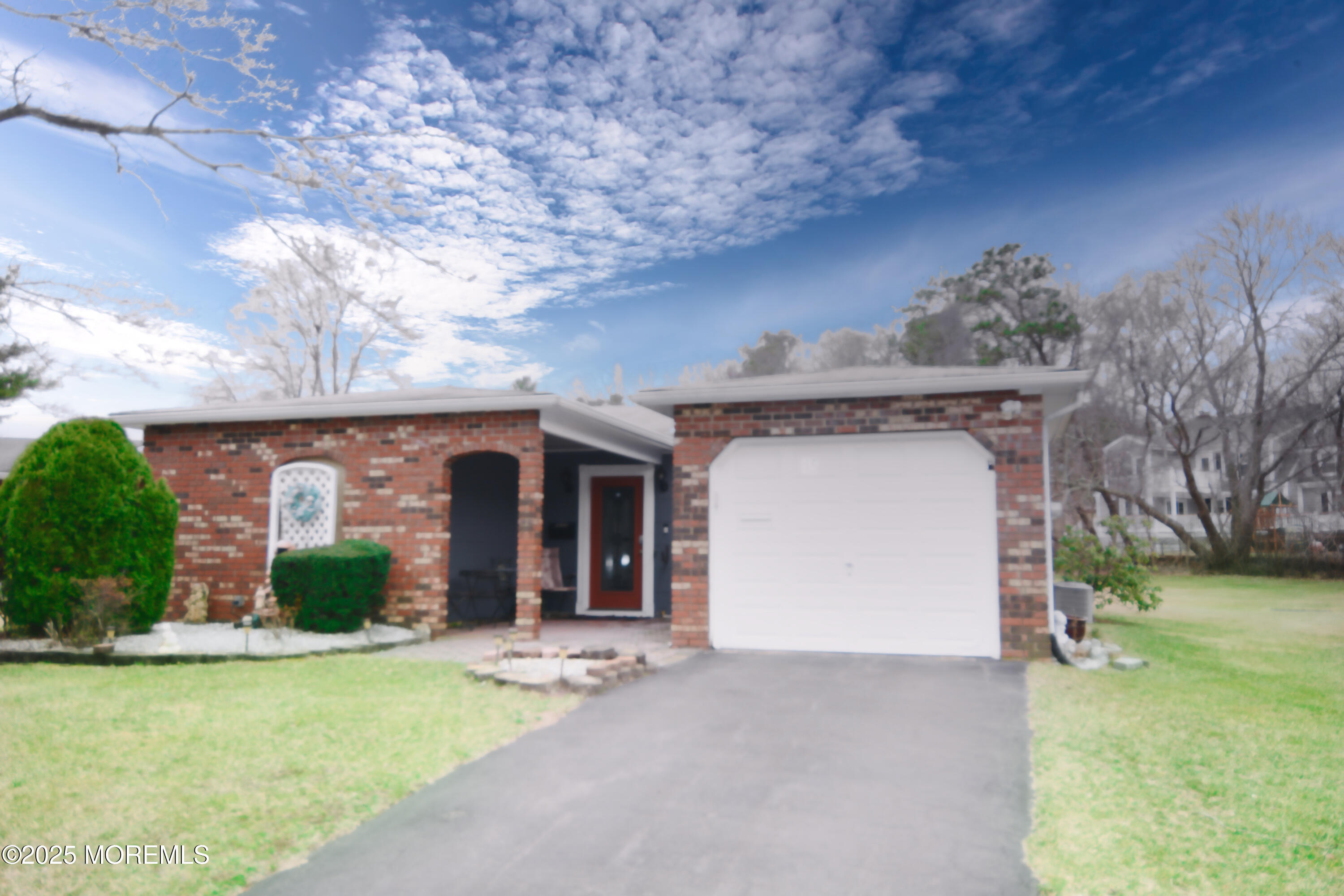 15 Markham Road Brick, NJ 08724 - Photo 2 of 28 a front view of a house with garden