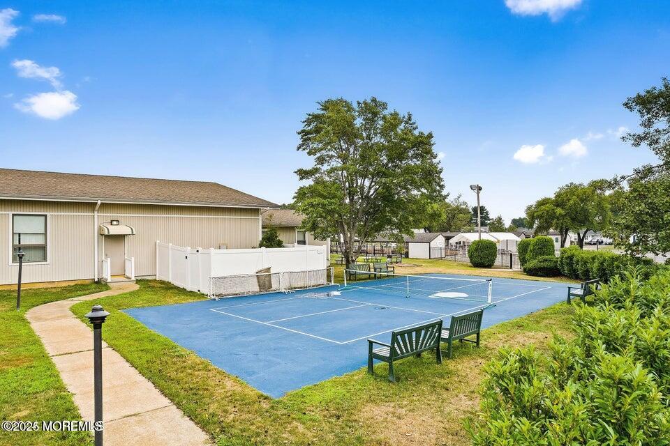 15 Markham Road Brick, NJ 08724 - Photo 26 of 28 a view of pool with lawn chairs and iron fence