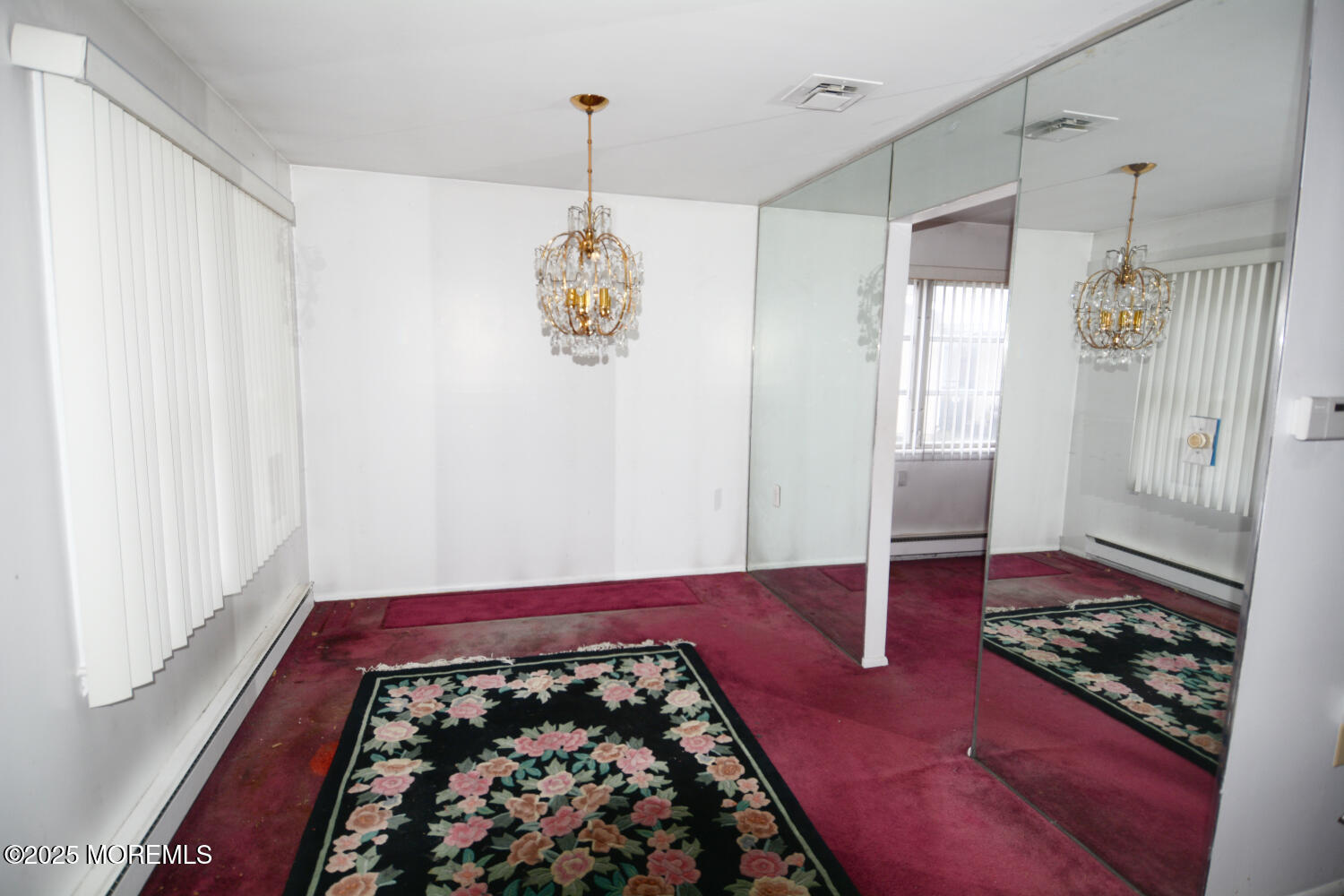 15 Markham Road Brick, NJ 08724 - Photo 5 of 28 a bedroom with a bed and a table in it