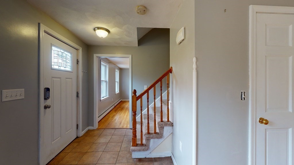 7 Nehemiah Road Shirley, MA 01464 - Photo 16 of 37 a view of a hallway with windows and stairs