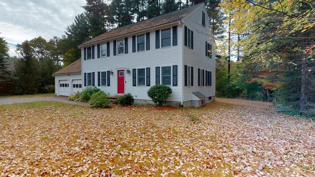 7 Nehemiah Road Shirley, MA 01464 - Photo 3 of 37 a front view of a house with garden
