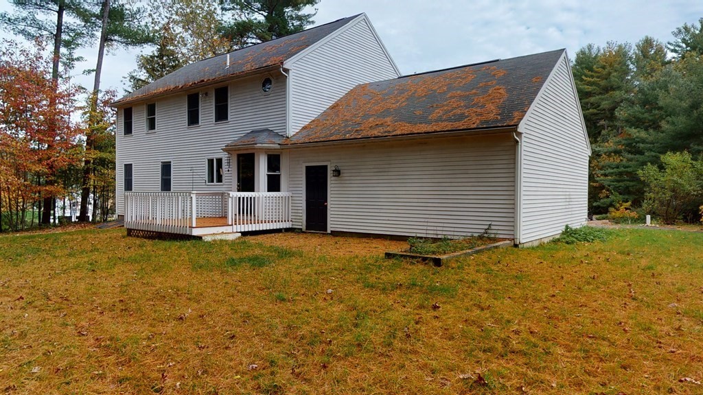 7 Nehemiah Road Shirley, MA 01464 - Photo 5 of 37 a view of an house with backyard and trees