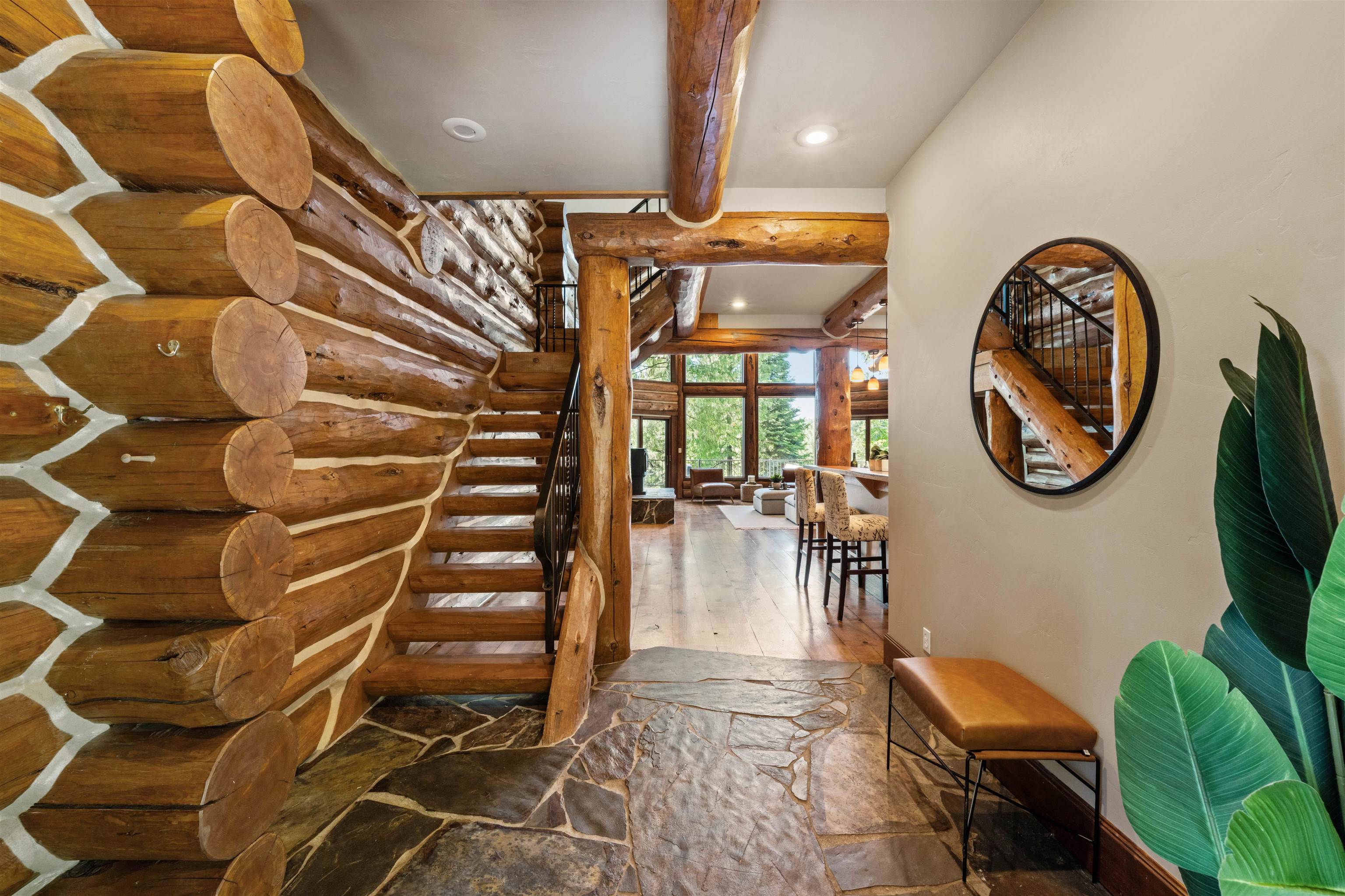 615 Alta Reservoir Road Alta, CA 95701 - Photo 3 of 21 Slate flooring and floor to ceiling windows whispers, "Glad you are here...."