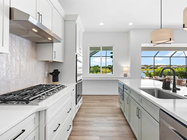 a bathroom with a toilet a sink and a mirror