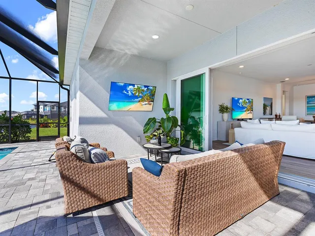 a sign that is sitting in front of a house