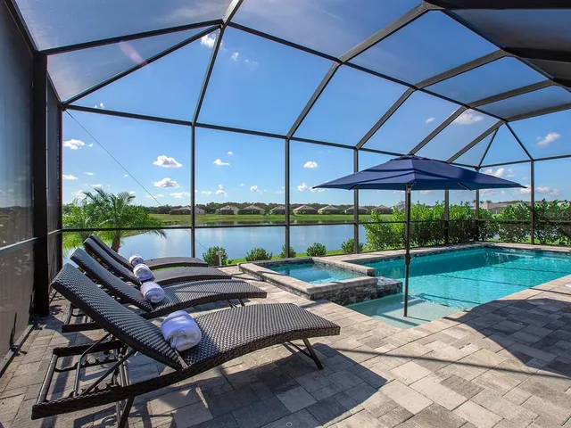 a view of a park with table and chairs