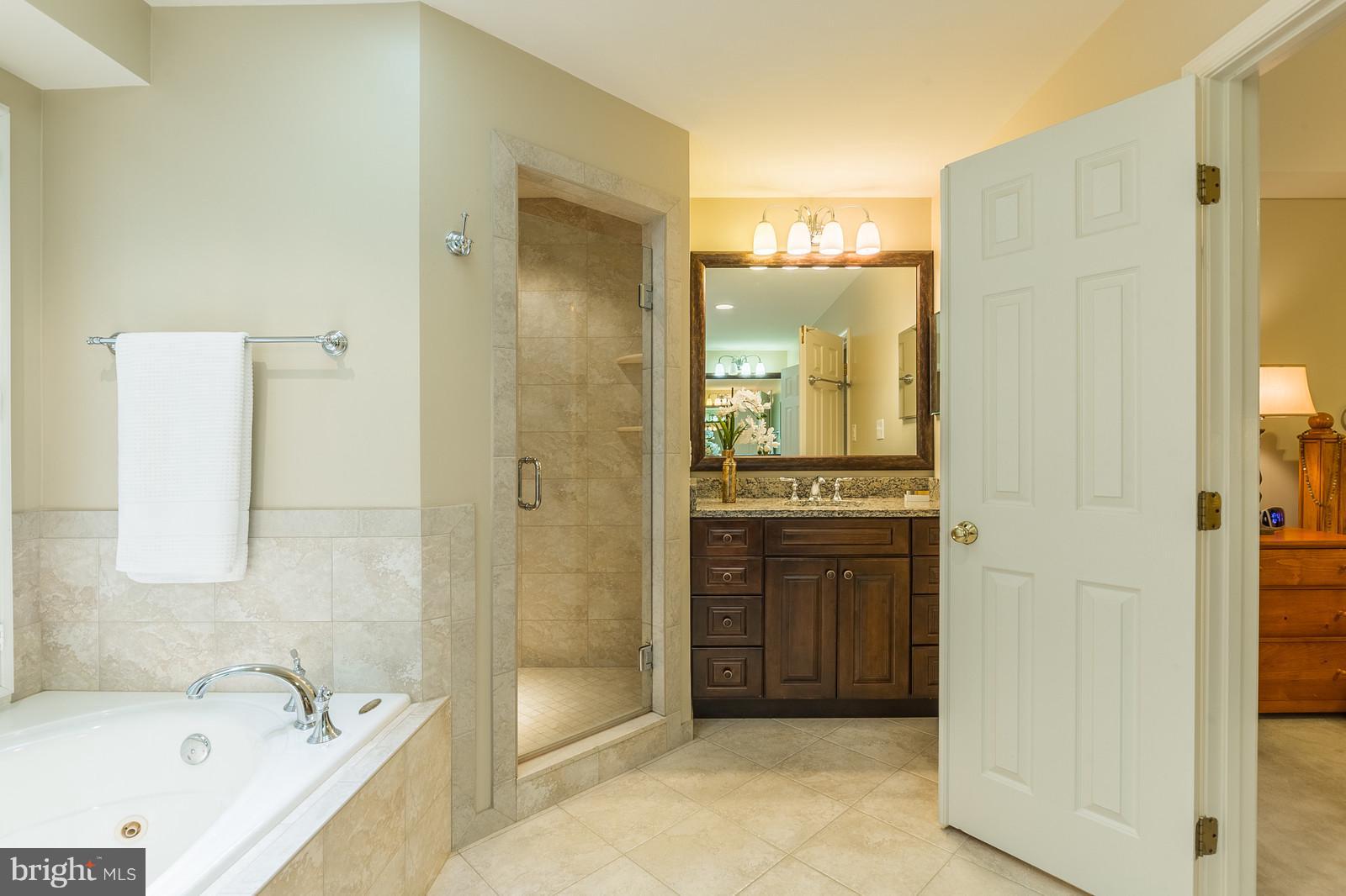 12101 Coloriver Road Manassas, VA 20112 - Photo 23 of 30 a bathroom with a bathtub and a sink