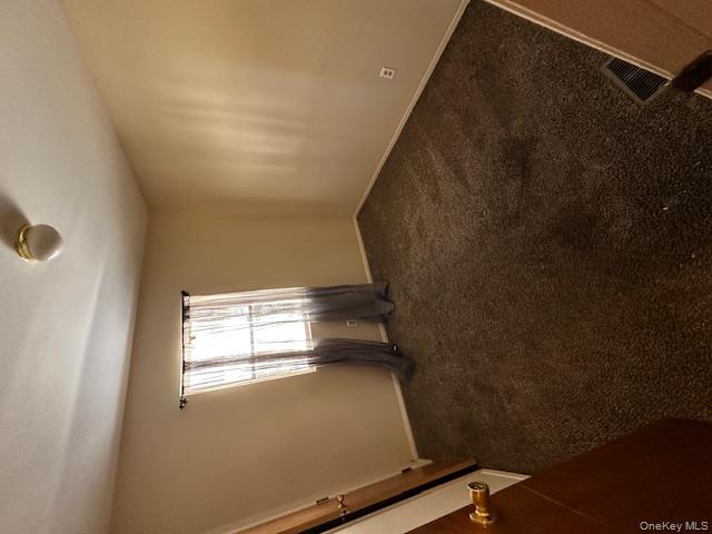 542 Post Avenue Bellport, NY 11713 - Photo 18 of 38 an empty room with windows