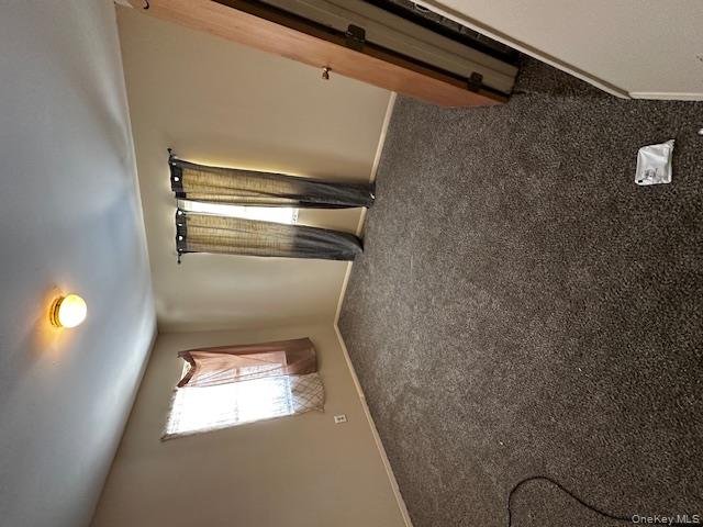 542 Post Avenue Bellport, NY 11713 - Photo 22 of 38 an empty room with windows