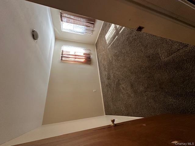 542 Post Avenue Bellport, NY 11713 - Photo 23 of 38 a view of an empty room