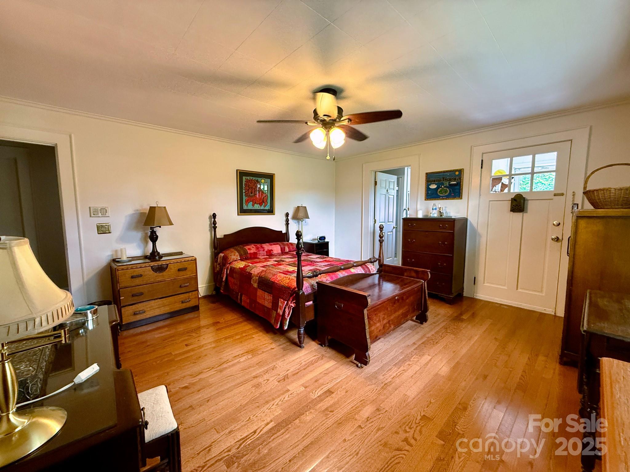 1441 Cove Road Rutherfordton, NC 28139 - Photo 16 of 36 a bedroom with furniture and a flat screen tv