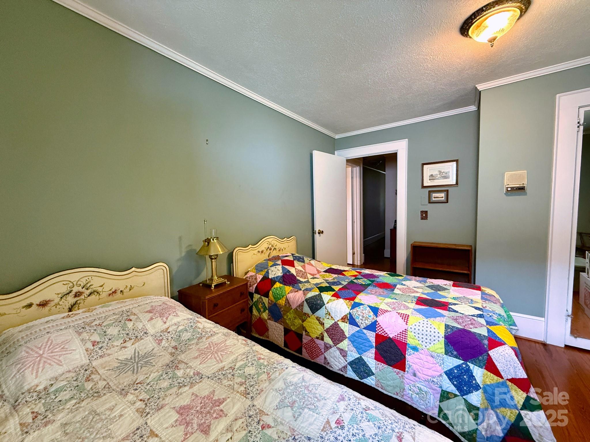 1441 Cove Road Rutherfordton, NC 28139 - Photo 19 of 36 a bedroom with two bed and a lamp