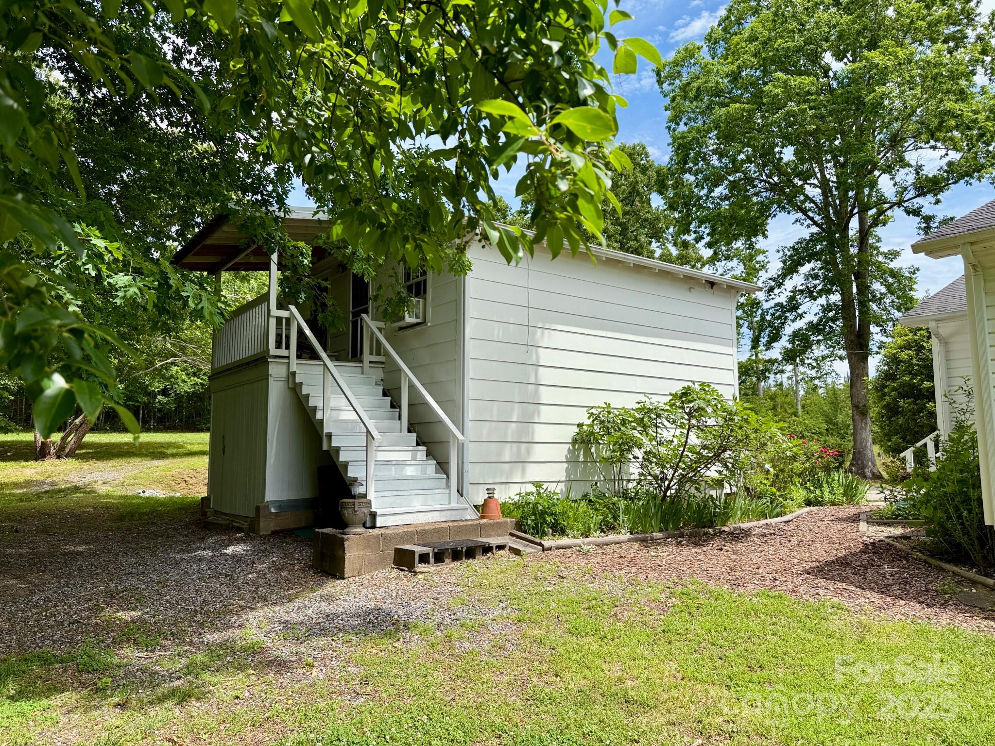 1441 Cove Road Rutherfordton, NC 28139 - Photo 27 of 36 a house with a tree in the background