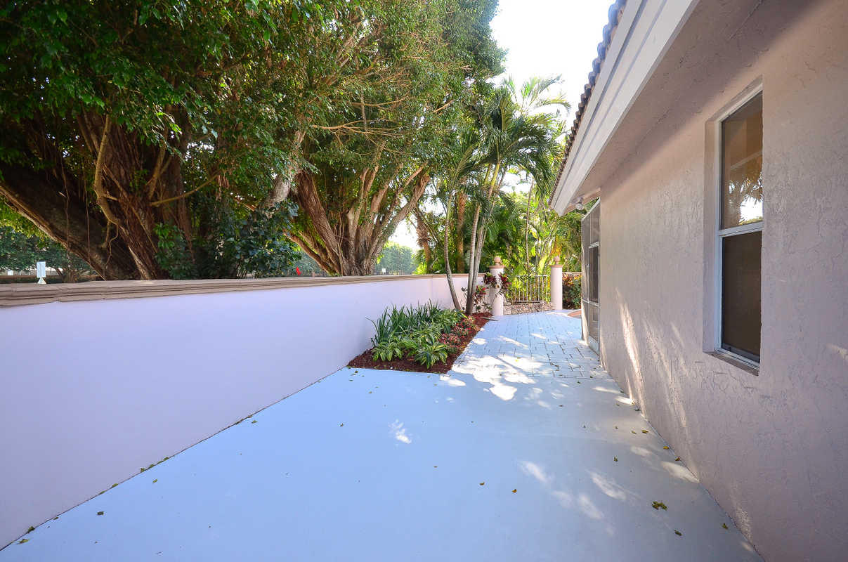 6601 Northwest 23rd Way Boca Raton, FL 33496 - Photo 35 of 36 SIDE OF HOME